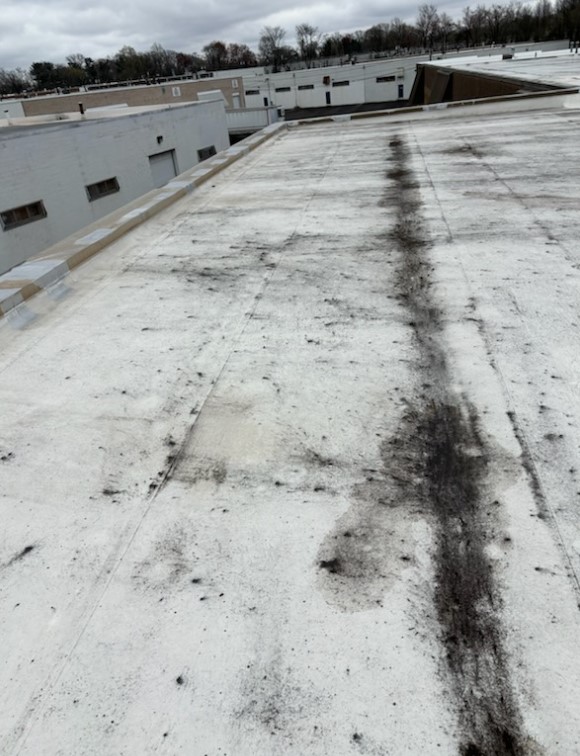 when is it time to consider a flat roof replacement in Philadelphia